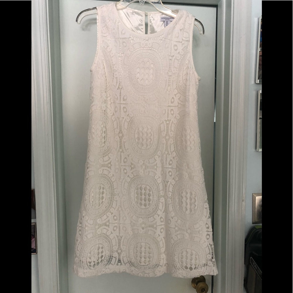 Katherine Barclay white decorative open lace dress.